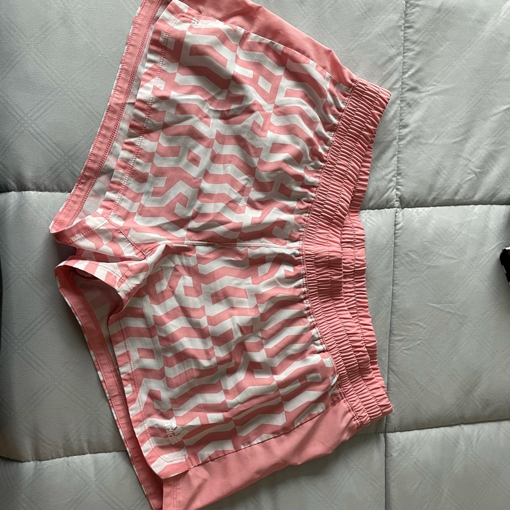 Pink and white Adidas shorts